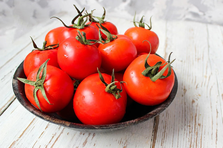 Tomatoes kept in a plate | Benefits of tomato