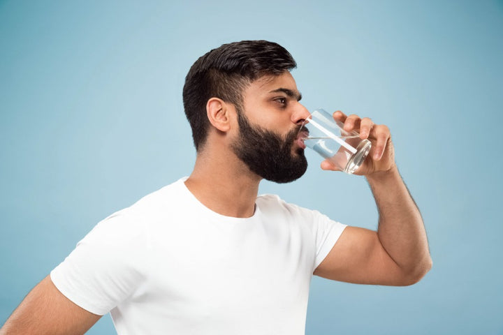 Benefits of drinking water after sex | water after sex | what to do after sex | man drinking water
