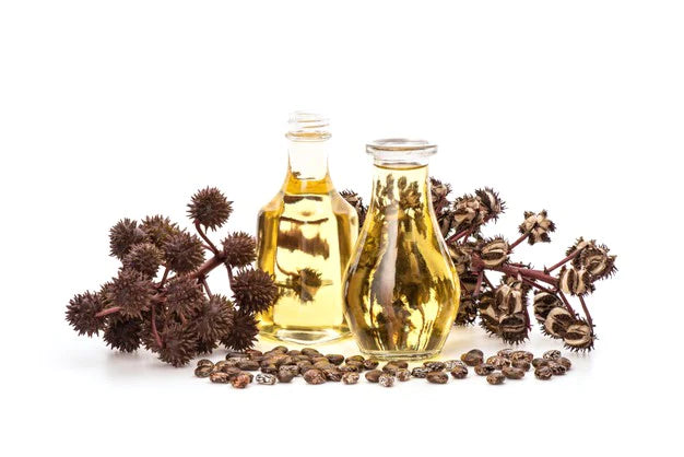 Glass bottles filled with oil | Castor Oil For Hair Growth