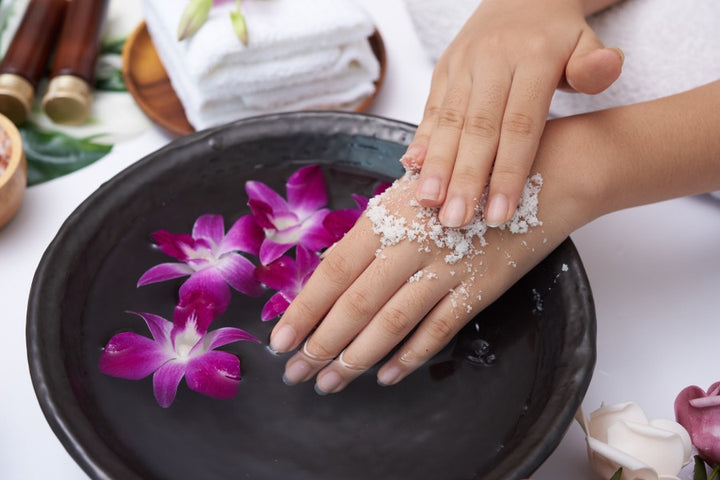 Over-Exfoliation can Harm Your Skin: Is it True? | exfoliation | exfoliating hands | scrubbing