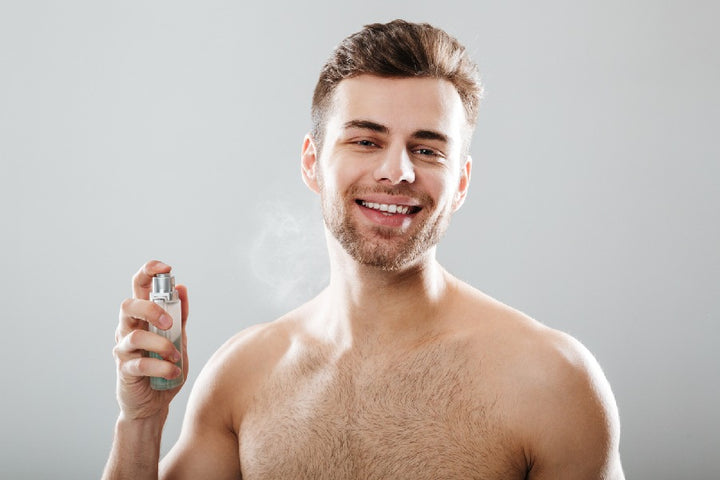 a man spraying a toner on his face