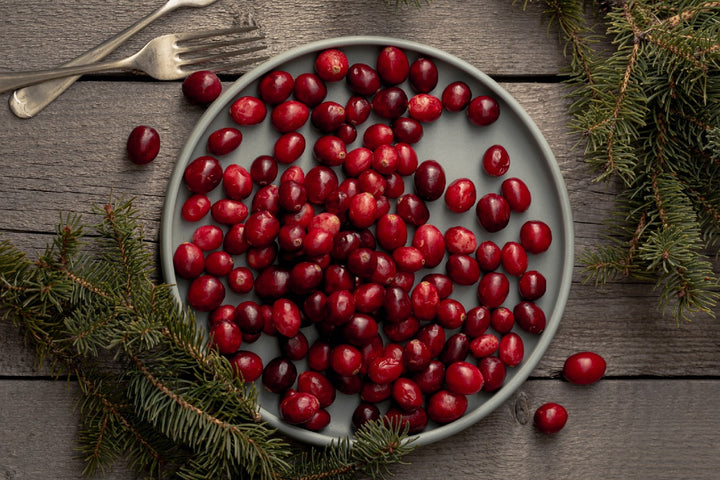 a plate full of cranberries