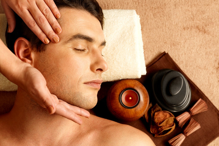 a man enjoying facial massage