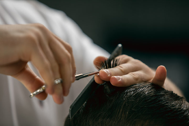 a man getting a hair cut